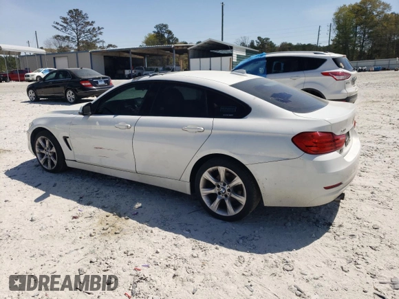 2015 BMW 4 Series 428i xDrive with VIN WBA4A7C50FD415218, listed as a Copart auction lot 50745555 with 139,343 mi miles and Salvage title. Bid and sale history available at DreamBid. Image 2.