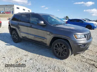 2020 Jeep Grand Cherokee Laredo E with VIN 1C4RJEAG8LC391401, listed as a Copart auction lot 80630874 with 122,083 mi miles and Salvage title. Bid and sale history available at DreamBid. Image 4.