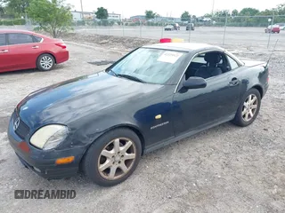 1999 Mercedes-Benz SLK 230/320 with VIN WDBKK47F0XF086064, listed as a IAAI auction lot 42223522 with 166,381 mi miles and . Bid and sale history available at DreamBid. Image 2.