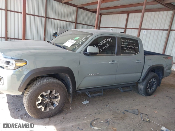 2023 Toyota Tacoma 4WD SR with VIN 3TMCZ5ANXPM613857, listed as a IAAI auction lot 41771957 with 76,232 mi miles. Bid and sale history available at carsss.com. Image 14.