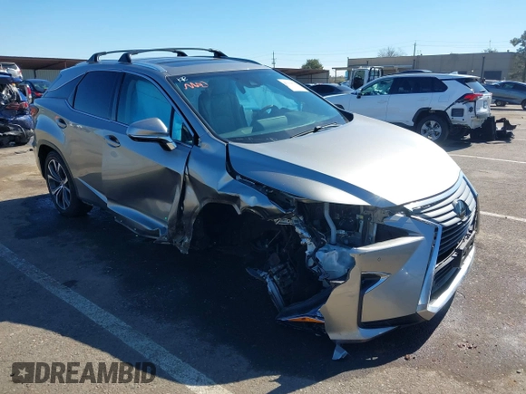 2018 Lexus RX 350 z VIN 2T2BZMCA7JC140852, wystawiony jako IAAI lot #41669823 z przebiegiem 56 306 mil mil oraz . Historia ofert i sprzedaży dostępna na DreamBid. Obrazek 6.