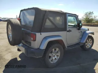 2015 Jeep Wrangler Sahara с VIN 1C4AJWBG1FL742588, выставлен на аукционе Copart как лот 72400274 с пробегом 139 520 миль миль и Списание • Salvage title. История ставок и продаж доступна на DreamBid. Изображение 3.