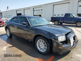 2009 Chrysler 300 LX with VIN 2C3KA43D49H615515, listed as a Copart auction lot 52409715 with 209,912 mi miles and Salvage Title. Bid and sale history available at carsss.com. Image 4.