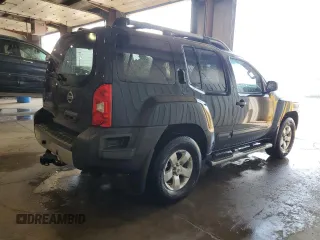 2013 Nissan Xterra S with VIN 5N1AN0NW7DN818218, listed as a Copart auction lot 59329255 with 122,697 mi miles and Salvage title. Bid and sale history available at DreamBid. Image 3.