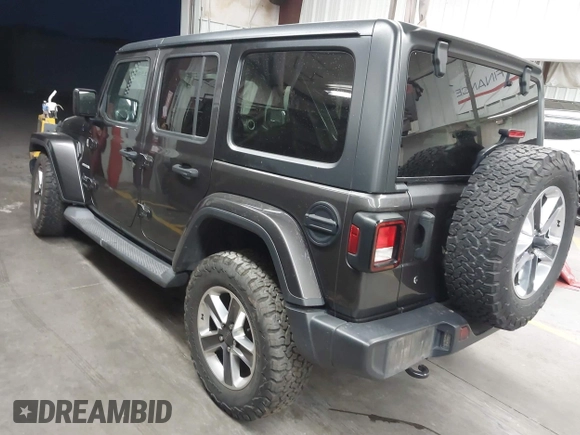 2019 Jeep Wrangler Unlimited Sahara с VIN 1C4HJXEN8KW588369, выставлен на аукционе IAAI как лот 42581061 с пробегом 90 710 миль миль и . История ставок и продаж доступна на DreamBid. Изображение 3.
