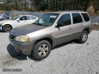 2001 Mazda Tribute LX with VIN 4F2YU091X1KM39019, listed as a Copart auction lot 50946945 with 255,148 mi miles and Salvage Title. Bid and sale history available at carsss.com. Image 1.