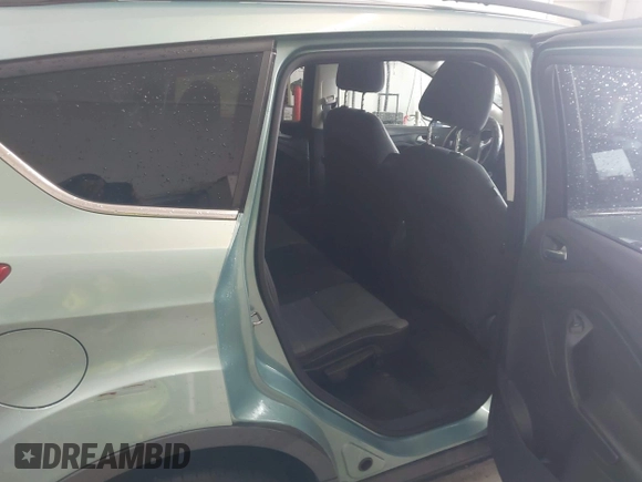 2013 Ford Escape SE with VIN 1FMCU0GX6DUC09872, listed as a IAAI auction lot 42020093 with 215,906 mi miles and . Bid and sale history available at DreamBid. Image 8.