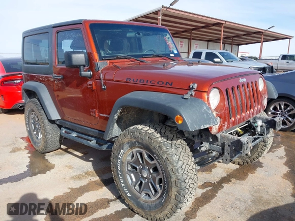 2014 Jeep Wrangler Rubicon with VIN 1C4BJWCG8EL185597, listed as a IAAI auction lot 41914489 with 85,545 mi miles and . Bid and sale history available at DreamBid. Image 1.