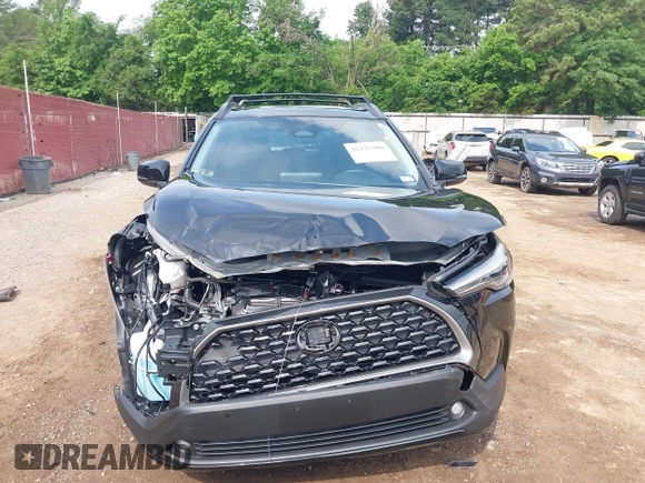 2024 Toyota Corolla Cross XLE z VIN 7MUDAAAG4RV099759, wystawiony jako IAAI lot #42123306 z przebiegiem 6 259 mil mil oraz . Historia ofert i sprzedaży dostępna na DreamBid. Obrazek 6.