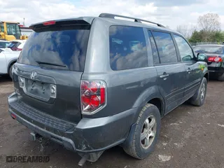 2007 Honda Pilot EX-L with VIN 5FNYF28527B022848, listed as a IAAI auction lot 42010116 with 240,277 mi miles. Bid and sale history available at carsss.com. Image 4.