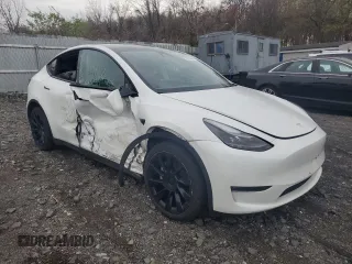 2023 Tesla Model Y Long Range with VIN 7SAYGDEE0PF746778, listed as a Copart auction lot 52704965 with 19,047 mi miles and Salvage Title. Bid and sale history available at DreamBid. Image 4.