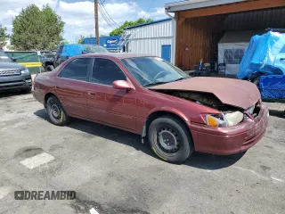 2000 Toyota Camry CE z VIN JT2BG22K4Y0449443, wystawiony jako Copart lot #58268475 z przebiegiem 292 853 mil mil oraz Szkoda całkowita • Salvage title. Historia ofert i sprzedaży dostępna na DreamBid. Obrazek 4.