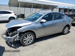 2012 Mazda 3 i Touring with VIN JM1BL1V8XC1618638, listed as a Copart auction lot 63480605 with 101,205 mi miles and Salvage title. Bid and sale history available at DreamBid. Image 1.