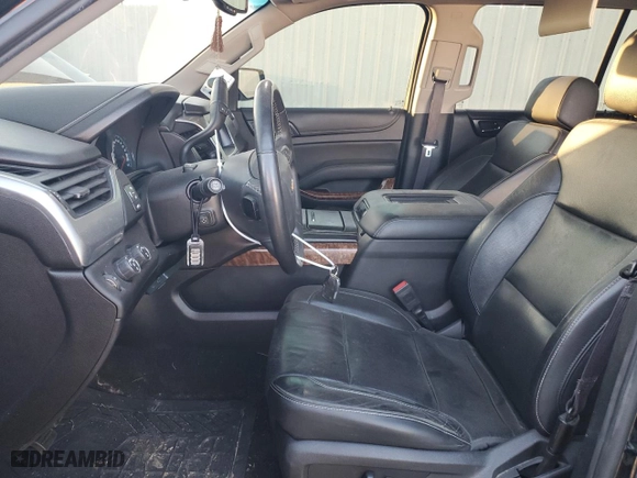 2017 Chevrolet Suburban Premier with VIN 1GNSKJKC5HR303600, listed as a Copart auction lot 83395644 with 124,465 mi miles and Salvage Title. Bid and sale history available at carsss.com. Image 7.