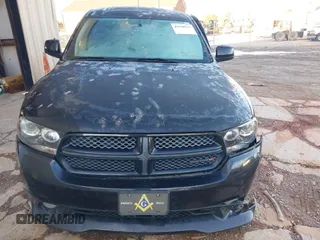 2013 Dodge Durango R/T z VIN 1C4SDHCT5DC558951, wystawiony jako IAAI lot #41590515 z przebiegiem 150 985 mil mil oraz . Historia ofert i sprzedaży dostępna na DreamBid. Obrazek 12.