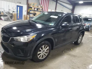 2015 Mazda CX-5 Sport with VIN JM3KE4BE1F0447267, listed as a Copart auction lot 82527174 with Not provided miles and Clean title. Bid and sale history available at DreamBid. Image 1.