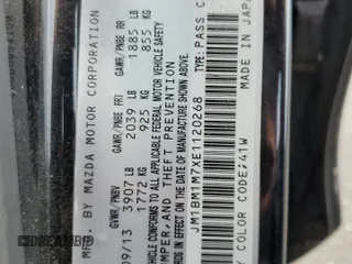 2014 Mazda 3 i Grand Touring with VIN JM1BM1M7XE1120268, listed as a Copart auction lot 43279765 with 93,075 mi miles and Salvage Title. Bid and sale history available at DreamBid. Image 12.