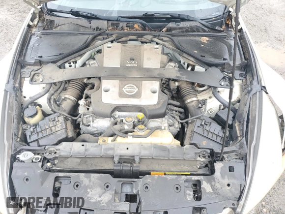 2012 Nissan 370Z z VIN JN1AZ4EHXCM562486, wystawiony jako Copart lot #44594005 z przebiegiem 79 150 mil mil oraz Szkoda całkowita • Salvage title. Historia ofert i sprzedaży dostępna na DreamBid. Obrazek 11.