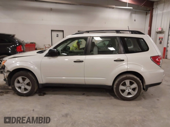 2012 Subaru Forester X with VIN JF2SHBBCXCH433191, listed as a IAAI auction lot 41964271 with 146,176 mi miles and . Bid and sale history available at DreamBid. Image 14.