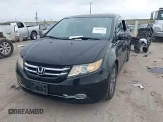 2014 Honda Odyssey Touring with VIN 5FNRL5H9XEB045695, listed as a IAAI auction lot 41545348 with 131,472 mi miles and . Bid and sale history available at carsss.com. Image 17.