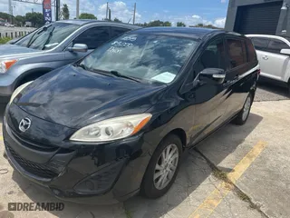 2015 Mazda Mazda5 Sport with VIN JM1CW2BLXF0182880, listed as a Copart auction lot 59904084 with 100,383 mi miles. Bid and sale history available at carsss.com. Image 2.