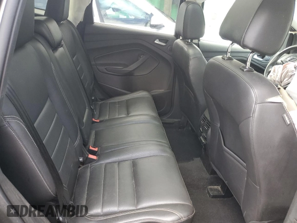 2016 Ford Escape Titanium with VIN 1FMCU9JX8GUB85463, listed as a Copart auction lot 58013684 with 147,620 mi miles and Salvage Title. Bid and sale history available at carsss.com. Image 11.