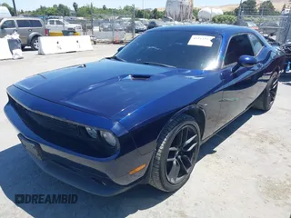 2013 Dodge Challenger R/T z VIN 2C3CDYBT9DH565280, wystawiony jako IAAI lot #42315527 z przebiegiem 128 638 mil mil oraz . Historia ofert i sprzedaży dostępna na DreamBid. Obrazek 19.