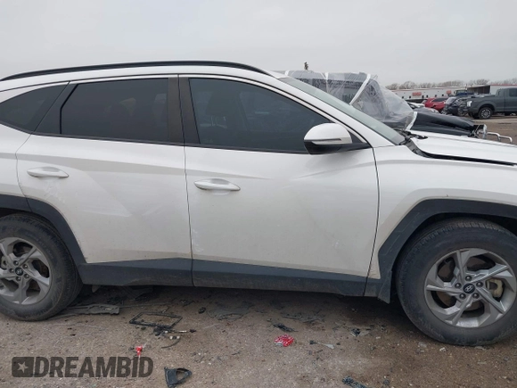 2023 Hyundai Tucson SEL with VIN 5NMJB3AE3PH179722, listed as a IAAI auction lot 41695398 with 54,285 mi miles and . Bid and sale history available at carsss.com. Image 13.