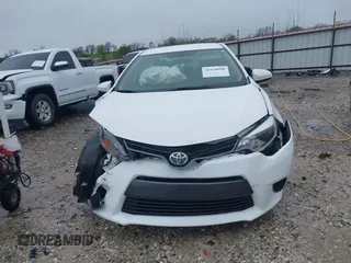 2016 Toyota Corolla L with VIN 5YFBURHE5GP485592, listed as a IAAI auction lot 41930690 with 121,861 mi miles and . Bid and sale history available at DreamBid. Image 13.