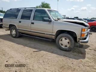1999 Chevrolet Suburban z VIN 3GNFK16R2XG191868, wystawiony jako Copart lot #57620165 z przebiegiem 128 526 mil mil oraz Szkoda całkowita • Salvage title. Historia ofert i sprzedaży dostępna na DreamBid. Obrazek 4.