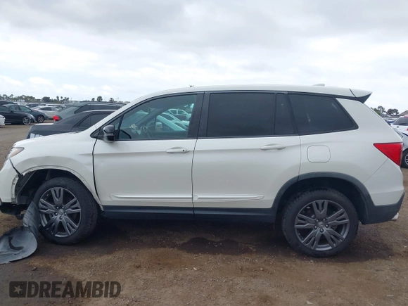 2019 Honda Passport EX-L with VIN 5FNYF7H57KB002844, listed as a IAAI auction lot 42195170 with 43,327 mi miles and . Bid and sale history available at DreamBid. Image 14.