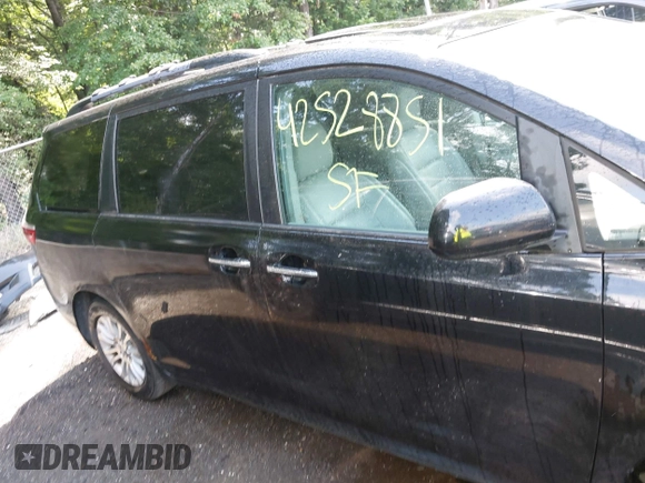 2015 Toyota Sienna XLE with VIN 5TDYK3DC8FS574645, listed as a IAAI auction lot 42528851 with 164,408 mi miles and . Bid and sale history available at DreamBid. Image 14.