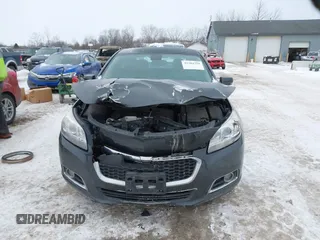 2014 Chevrolet Malibu LT with VIN 1G11E5SL2EF189807, listed as a IAAI auction lot 41304350 with 150,775 mi miles and . Bid and sale history available at DreamBid. Image 12.