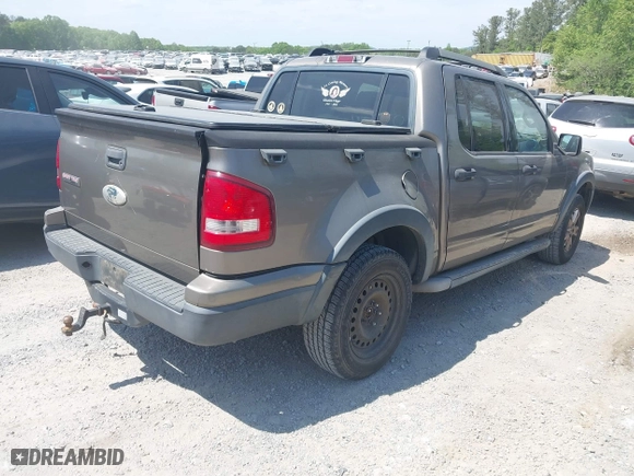 2007 Ford Explorer Sport Trac XLT with VIN 1FMEU31K97UA28843, listed as a IAAI auction lot 42066888 with 407,707 mi miles. Bid and sale history available at carsss.com. Image 4.