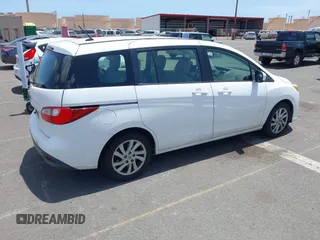 2012 Mazda 5 Sport with VIN JM1CW2BL7C0124897, listed as a IAAI auction lot 42269582 with 230,070 mi miles and . Bid and sale history available at DreamBid. Image 4.