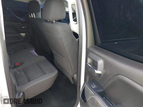 2018 Chevrolet Silverado 1500 LT with VIN 1GCRCREC2JZ361099, listed as a IAAI auction lot 41306266 with 121,924 mi miles and . Bid and sale history available at DreamBid. Image 8.
