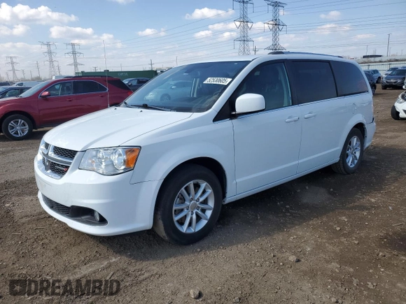 2019 Dodge Grand Caravan SXT with VIN 2C4RDGCG7KR663085, listed as a Copart auction lot 52530605 with 64,590 mi miles and Salvage Title. Bid and sale history available at DreamBid. Image 1.