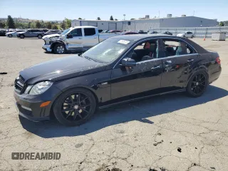 2011 Mercedes-Benz E 63 AMG with VIN WDDHF7HB2BA447920, listed as a Copart auction lot 61495535 with 145,483 mi miles and Salvage title. Bid and sale history available at DreamBid. Image 1.
