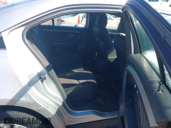 2013 Ford Taurus SEL with VIN 1FAHP2E8XDG164903, listed as a IAAI auction lot 41580690 with 163,128 mi miles and . Bid and sale history available at carsss.com. Image 8.