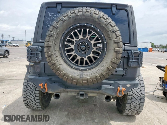 2021 Jeep Wrangler Unlimited Rubicon with VIN 1C4HJXFG5MW542260, listed as a Copart auction lot 59476655 with 19,870 mi miles and Salvage title. Bid and sale history available at DreamBid. Image 6.