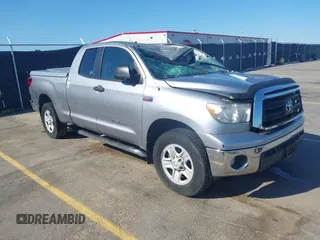 2012 Toyota Tundra z VIN 5TFUY5F11CX220590, wystawiony jako IAAI lot #42127166 z przebiegiem 129 095 mil mil oraz . Historia ofert i sprzedaży dostępna na DreamBid. Obrazek 1.