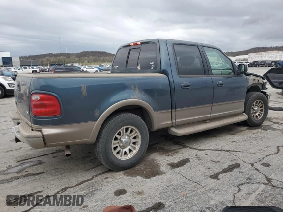 2001 Ford F-150 XLT with VIN 1FTRW07LX1KA18940, listed as a Copart auction lot 50723495 with 133,686 mi miles and Salvage title. Bid and sale history available at DreamBid. Image 3.