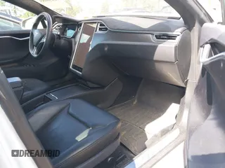 2016 Tesla Model S 90D with VIN 5YJSA1E22GF155747, listed as a IAAI auction lot 42630085 with 97,896 mi miles and . Bid and sale history available at DreamBid. Image 5.