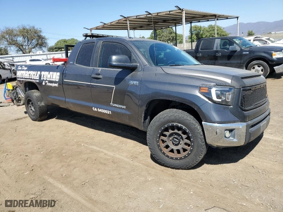 2014 Toyota Tundra 4WD Truck SR with VIN 5TFCY5F17EX016164, listed as a Copart auction lot 69178594 with 379,751 mi miles and Salvage Title. Bid and sale history available at carsss.com. Image 4.