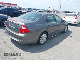 2010 Ford Fusion Hybrid with VIN 3FADP0L37AR270739, listed as a IAAI auction lot 42143035 with 238,111 mi miles. Bid and sale history available at carsss.com. Image 4.