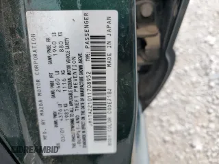 2001 Mazda Millenia z VIN JM1TA221011708952, wystawiony jako Copart lot #64995014 z przebiegiem Nie podano mil oraz Szkody całkowita. Historia ofert i sprzedaży dostępna na DreamBid. Obrazek 12.