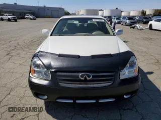 2005 Infiniti Q45 z VIN JNKBF01A65M101461, wystawiony jako Copart lot #50030865 z przebiegiem 211 747 mil mil oraz Czysty tytuł • Clean title. Historia ofert i sprzedaży dostępna na DreamBid. Obrazek 5.