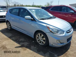 2012 Hyundai Accent SE with VIN KMHCU5AE0CU022050, listed as a IAAI auction lot 41955452 with 140,460 mi miles. Bid and sale history available at carsss.com. Image 1.
