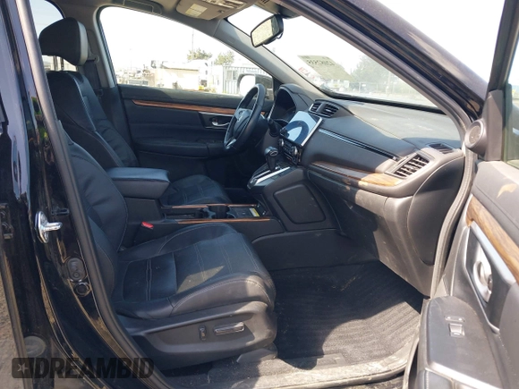 2021 Honda CR-V Touring with VIN 2HKRW2H96MH681908, listed as a IAAI auction lot 42082535 with 65,570 mi miles and . Bid and sale history available at DreamBid. Image 5.