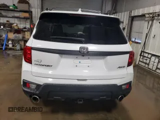 2023 Honda Passport EX-L z VIN 5FNYF8H59PB011459, wystawiony jako Copart lot #80345424 z przebiegiem 23 050 mil mil oraz Szkoda całkowita • Salvage title. Historia ofert i sprzedaży dostępna na DreamBid. Obrazek 6.